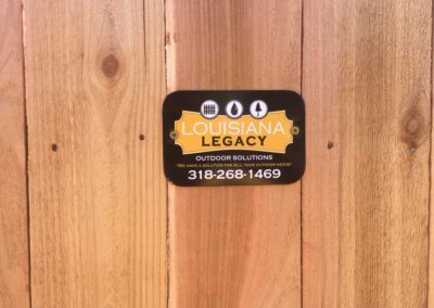 Image of a fence with black metal bars.